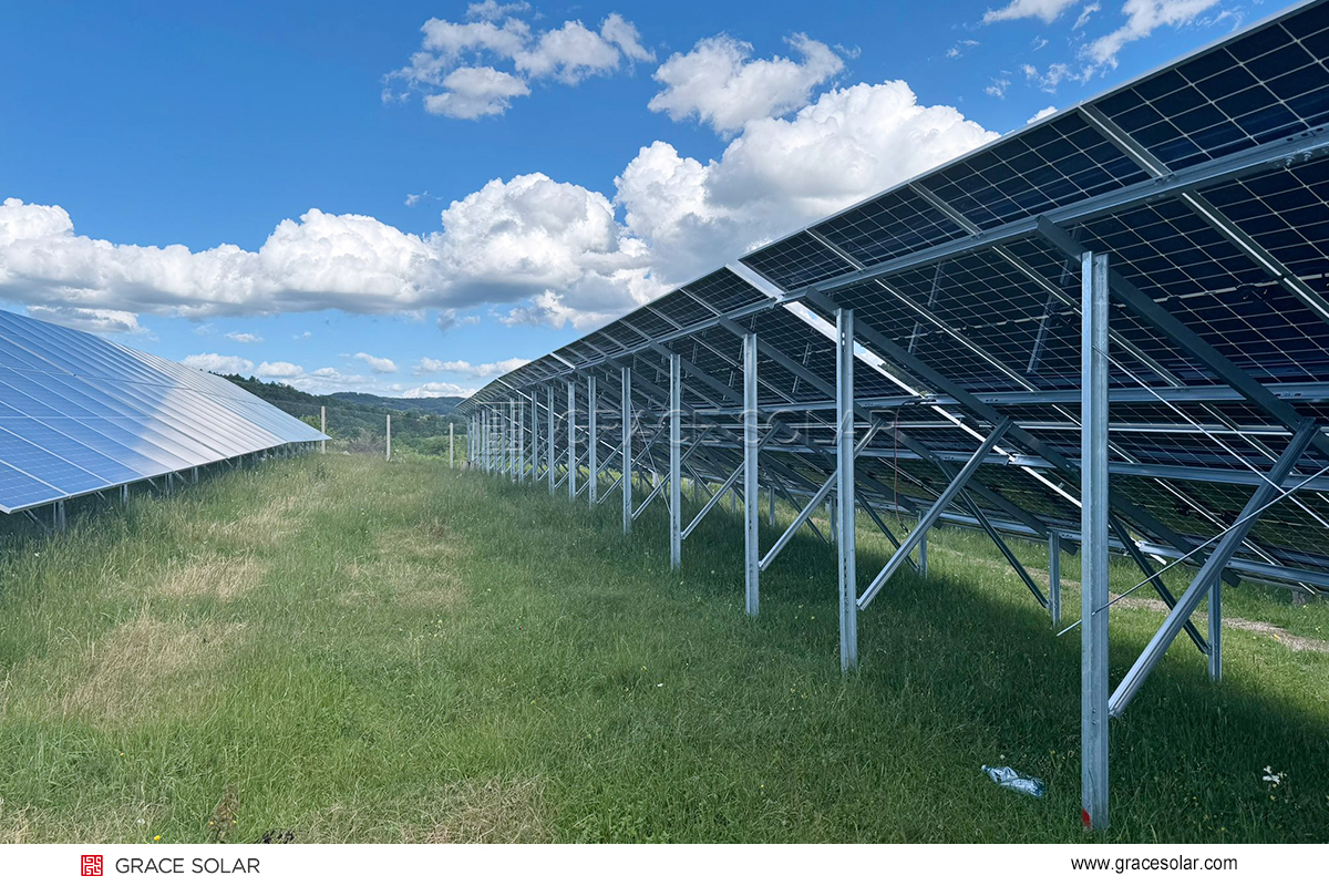 AI solar cleaning robot removing Sahara dust on dual-axis trackers in Germany